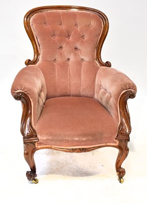 Lot 17 - A Victorian walnut framed spoon-back armchair,...