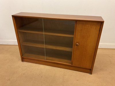 Lot 663 - HERBERT E GIBBS, LONDON; a glazed bookcase...