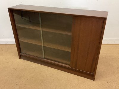 Lot 664 - HERBERT E GIBBS, LONDON; a glazed bookcase...