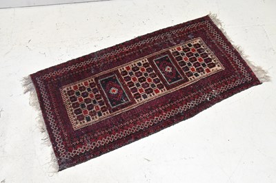 Lot 1160 - A hand woven wool Bokhara rug, worked with a...