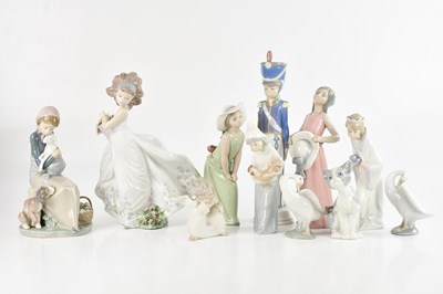 Lot 1390 - LLADRO; a collection of six female figures,...