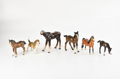 Lot 1442 - BESWICK; five models of foals and a model of a...