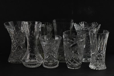 Lot 1608 - A collection of eight cut glass vases, largest...