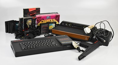 Lot 1199 - A Sinclair ZX Spectrum +3, with a gun, with...