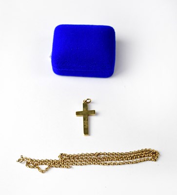 Lot 1029 - A 9ct yellow gold cross and a 9ct yellow gold...