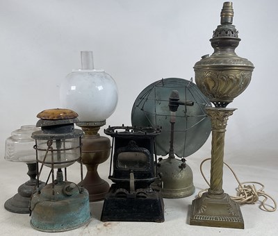Lot 615 - A small amount of oil lamps and heaters.