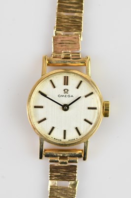 Lot 1043 - OMEGA; a lady's 9ct gold cased wristwatch, the...