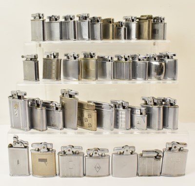 Lot 369 - A large collection of vintage pocket lighters,...