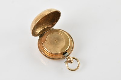 Lot 4 - A 9ct gold sovereign holder, with planished...