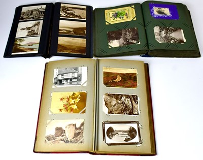 Lot 492 - Three early 20th century well stocked postcard...