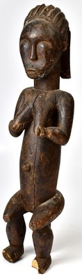 Lot 190 - A Fang Gabon carved hardwood female figure,...