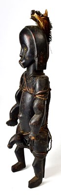 Lot 220 - An Akan, Ivory Coast carved hardwood male...