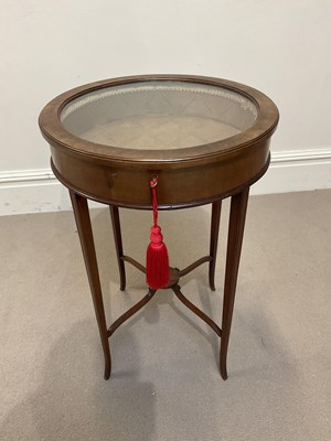Lot 1126 - A 19th century walnut circular bijouterie...