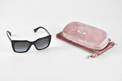 Lot 1232 - MIU MIU; a pair of black large rimmed...