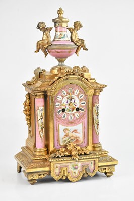 Lot 1163 - A 19th century French gilt metal and porcelain...