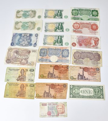 Lot 666 - A mixed lot of banknotes, to include Bank of...