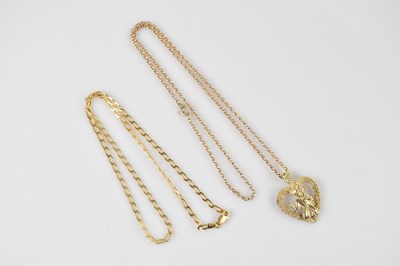 Lot 374 - A 9ct yellow gold St Christopher heart shaped...