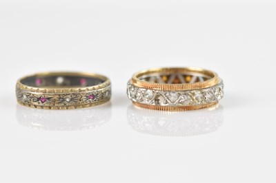 Lot 636 - A 9ct white and yellow gold eternity ring set...