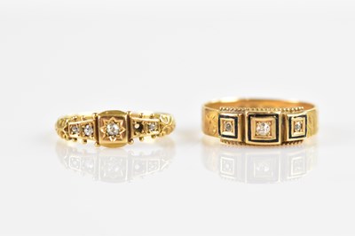 Lot 534 - An 18ct yellow gold diamond set three stone...
