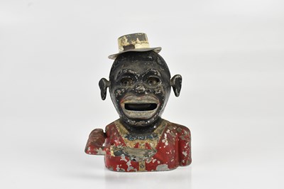 Lot 1237 - A vintage cast alloy mechanical money bank,...