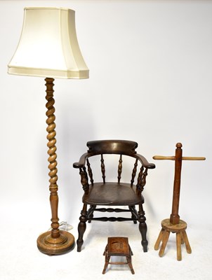 Lot 37 - An oak barleytwist column standard lamp with a...