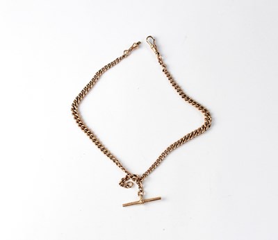 Lot 1090 - A 9ct rose gold watch chain with T-bar and...