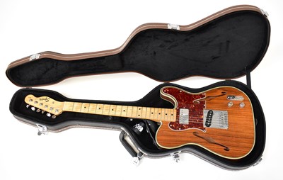 Lot 469 - A Fender Squire Tele guitar, in wood finish...