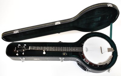 Lot 467 - KMISE; a five string banjolele, in a fitted case.