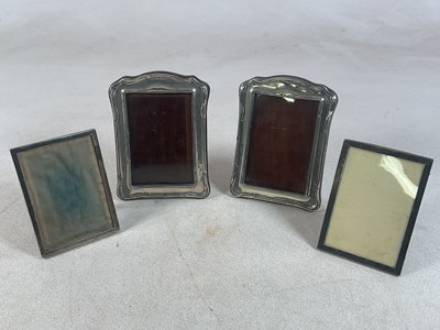 Lot 596 - Two pairs of George V hallmarked silver...