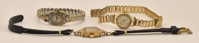 Lot 1682 - ACCURIST; three 9ct yellow gold lady's...