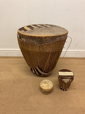 Lot 134 - A large African rattan zebra skin drum, 48 x...