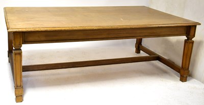 Lot 30 - An Edwardian oak dining table on square...