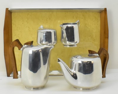 Lot 527 - NEWMAID; a five piece Picquot ware tea set...