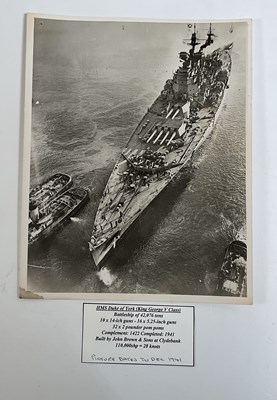 Lot 355 - An album containing fifty black and white...