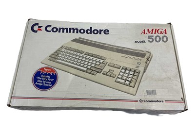Lot 27 - COMMODORE; an Amiga 500 electronic keyboard...
