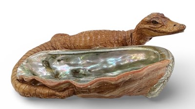 Lot 505 - An early 20th century taxidermy baby alligator,...