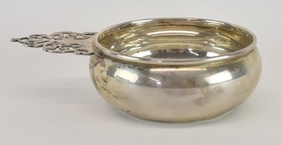 Lot 1165 - GUMP'S; an American sterling silver porringer,...