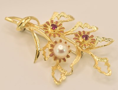 Lot 1500 - An 18ct yellow gold ruby and cultured pearl...