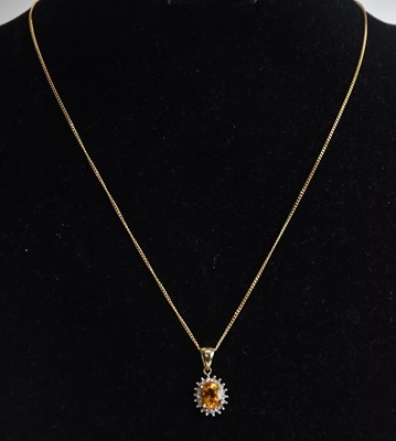 Lot 1468 - A 9ct yellow gold citrine and white stone set...