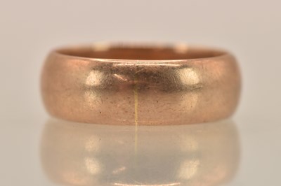 Lot 1371 - A 9ct yellow gold band ring, size P, approx...