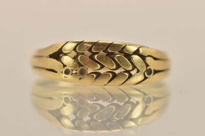 Lot 1384 - A 9ct yellow gold 'knot' ring, size L, approx...