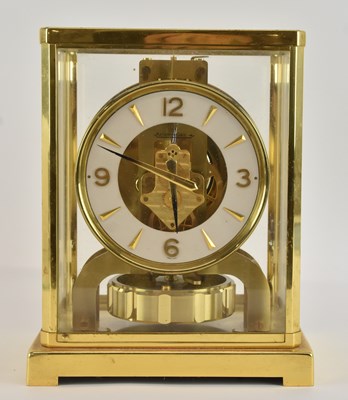Lot 133 - JAEGER-LECOULTRE; a 1970s gilt brass cased...