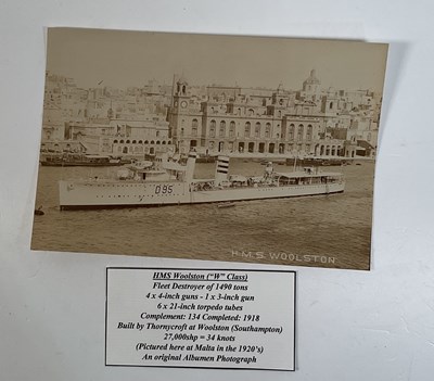 Lot 350 - An album containing seventy-two black and...