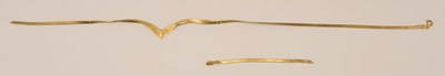 Lot 1456 - A 9ct yellow gold semi-rigid multistrand...