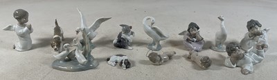 Lot 208 - LLADRO; a collection of thirteen figures to...
