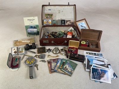 Lot 80 - A small suitcase containing numerous...