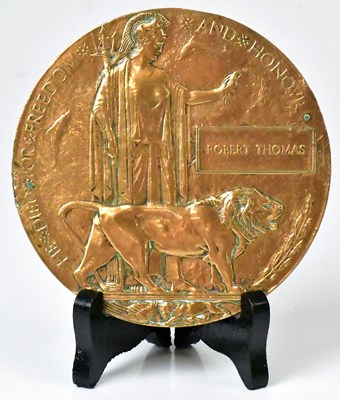 Lot 497 - A WWI memorial plaque for Robert Thomas,...