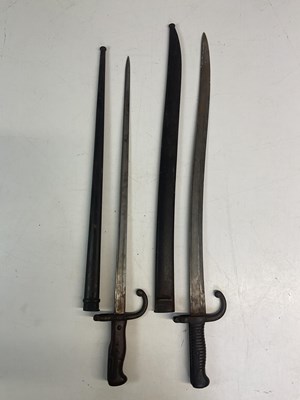 Lot 16 - Two bayonets, comprising a Chassepot bayonet,...