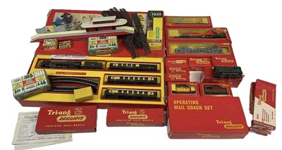 Lot 151 - TRI-ANG AND DINKY LOT; a boxed train set...