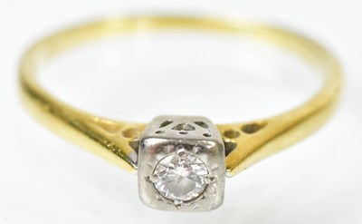 Lot 712 - An 18ct yellow gold ring set with a diamond in...